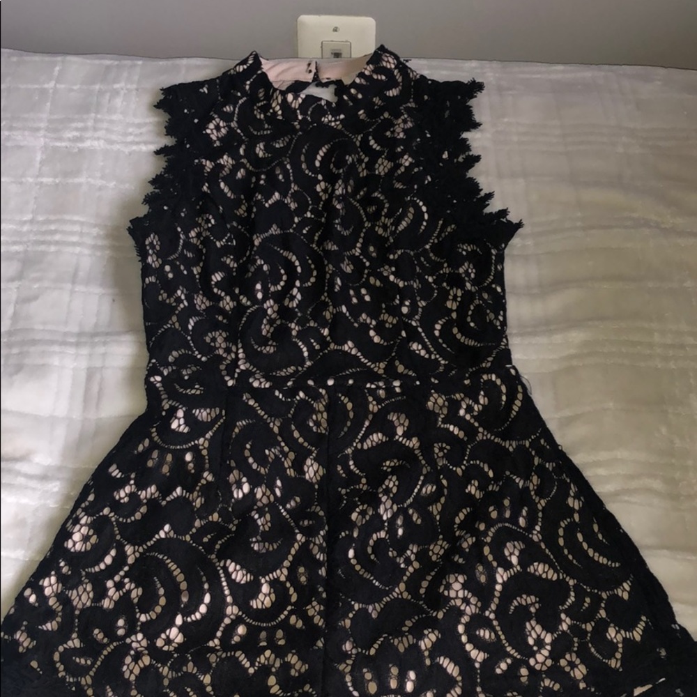 Francesca’s lace open back romper